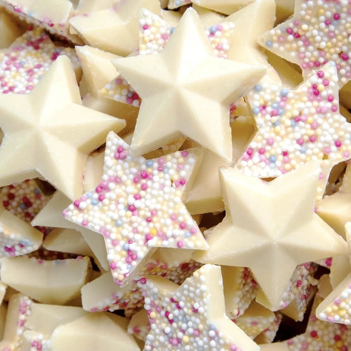 White Chocolate Snowie Stars with colourful candy sprinkles

